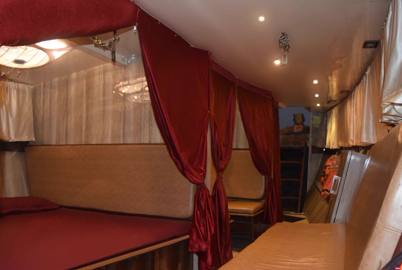 Double sleeping setup inside the Max Adventures houseboat